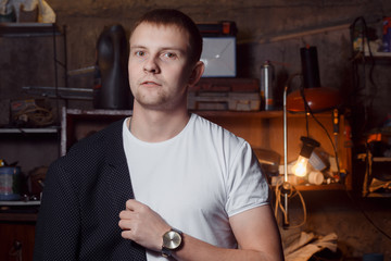 man in suit on an industrial premises, businessman
