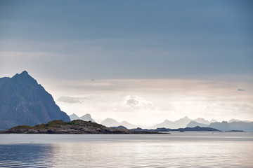 Fototapeta na wymiar Norway fjord and islands. Cloudy Nordic day.