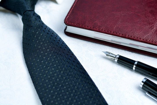 Men's accessories - notebook, shirt, tie and cufflinks