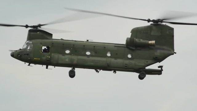 10958 Chinook CH-47 Helicopter fly by Apache background
