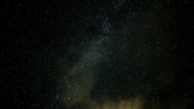 A time lapse of a starry night with clouds. Made with Nikon D800 (36 MegaPixel) and 14-24mm lens. 11022