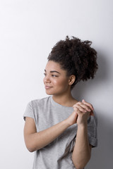 Portrait of young woman indoors, casual clothes 