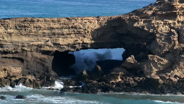 wave crash into lava cave 11092
