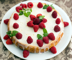 raspberry cake decorated with mint