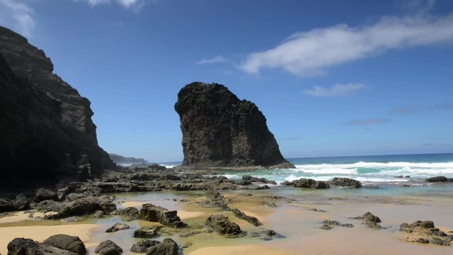 Roque del Morro med beach waves background 11098
