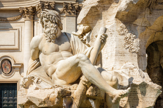 One of the statues of Fountain of Four Rives at Piazza Navona in Rome, Lazio region, Italy.