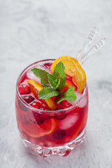 cranberry cocktail with ice and mint