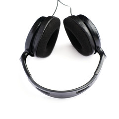 Black headphones isolated over white background