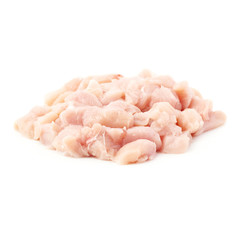 Raw chicken fillet cutted into pieces isolated over white background