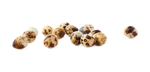 Quail eggs isolated over white background