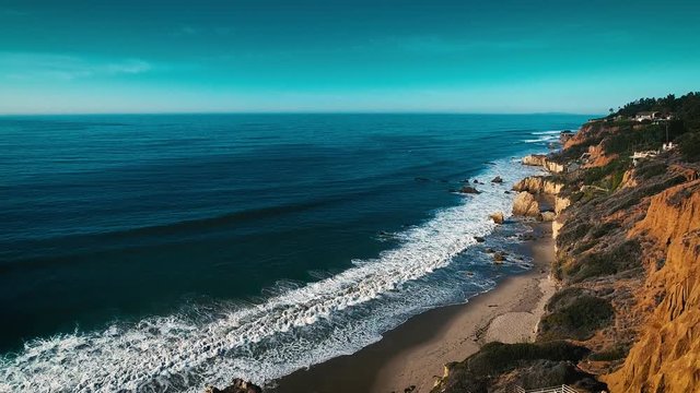 Deserted Wild El Matador Beach Malibu California Aerial Ocean View - Waves with Rocks