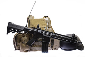 Army bulletproof vest, helmet and rifle isolated/Military body armor,assault rifle and black helmet...