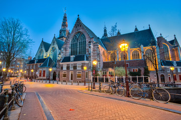 Fototapeta premium The Oude Church in Amsterdam City, Netherlands