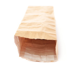 Brown paper pack for tea or coffee isolated over white background