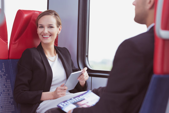 Businesswoman traveling in train