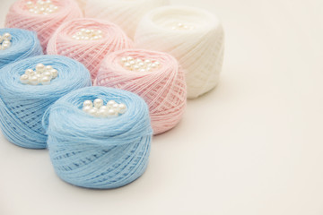 Fototapeta na wymiar colorful balls of yarn on a white background
