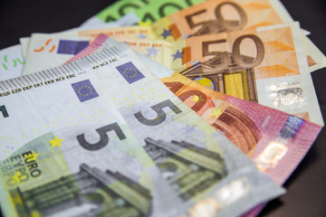 Background of euro bills. Shallow focus. Euro banknotes. 