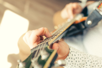 man playing electric guitar © fotofabrika