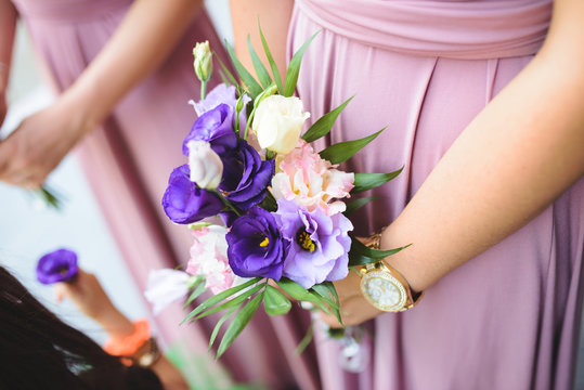 Bridesmaid with Violet Flowers