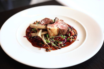 Lamb rack with pickled beetroot and black lentil ragout