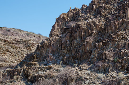 Rocky outcrop in arid Namib Desert of Angola