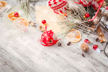 Fototapeta na wymiar Christmas winter decoration on rustic white wooden background wi
