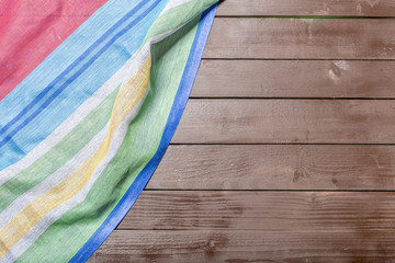 Tablecloth textile on wooden background