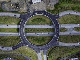 aerial view of cars on highway roundabout  © sumos