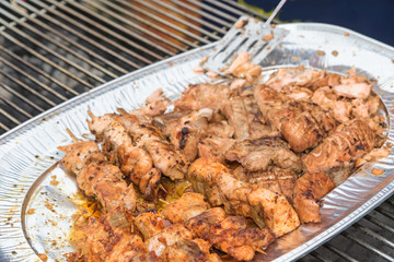 Street food - Grilled pices of salmon prepared on the tray