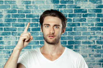 Portrait of handsome young thoughtful man