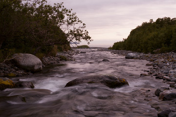 The mouth of the river flows into the sea. Koni peninsula, the Sea of Okhotsk, Hindzha River,...