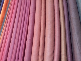 Colorful clothes for sale at store