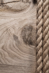 Vintage twisted flax ropes on wooden board
