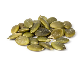 Pumpkin seeds on a white background.