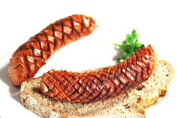 zwei gebratene Bockwürste/ eingeschnitten / Freigestellt  