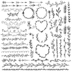 Set of Doodle floral elements and arrows