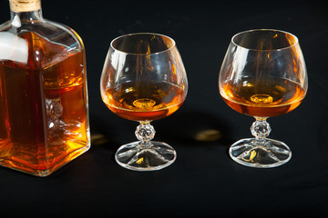 Bottle and glasses of brandy