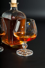 Glass of brandy and a carafe