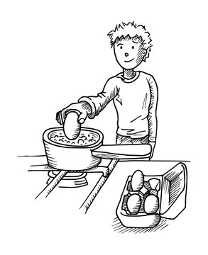 Jongen doet ei in de pan