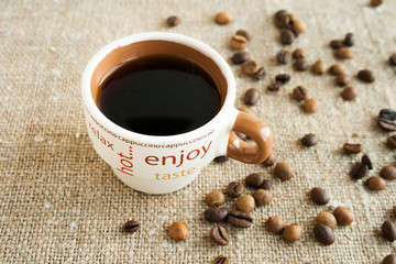 Coffee cup and coffee beans
