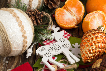 Christmas balls, mandarins and Christmas wreath