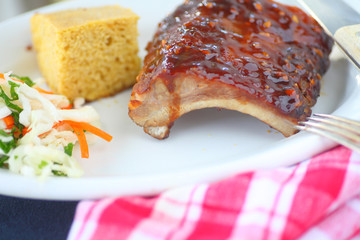 Tender pork ribs cooked with a sauce of honey, garlic and hoisin sauce