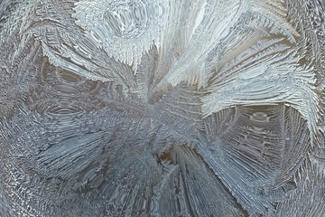 Abstract winter pattern of ice on glass
