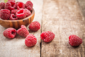 Pizza margarita with cheese and tomato isolated on rustic wooden table