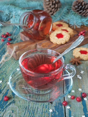 Cup of tea and Christmas decorations