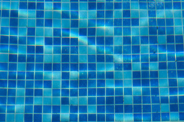 Blue swimming pool tile background