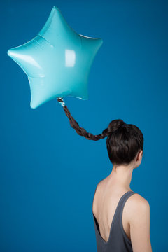 Star shaped balloon attached to braid