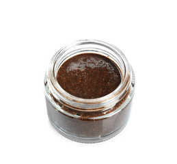 Glass jar of coffee natural scrub on white background