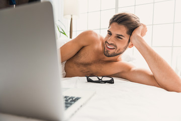 Relaxed young man in online