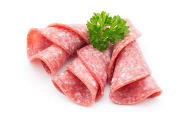 Salami sausage slices isolated on white background.